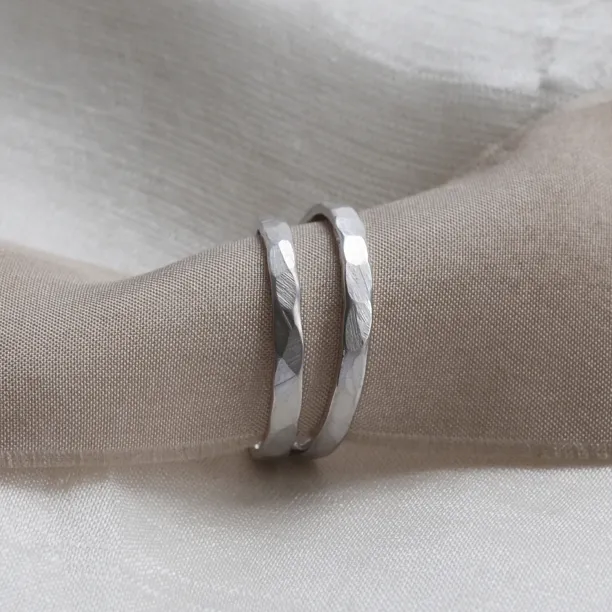 Matte platinum wedding bands with hammered surface ETA Image