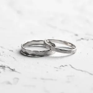 Matte platinum wedding bands with hammered surface ETA