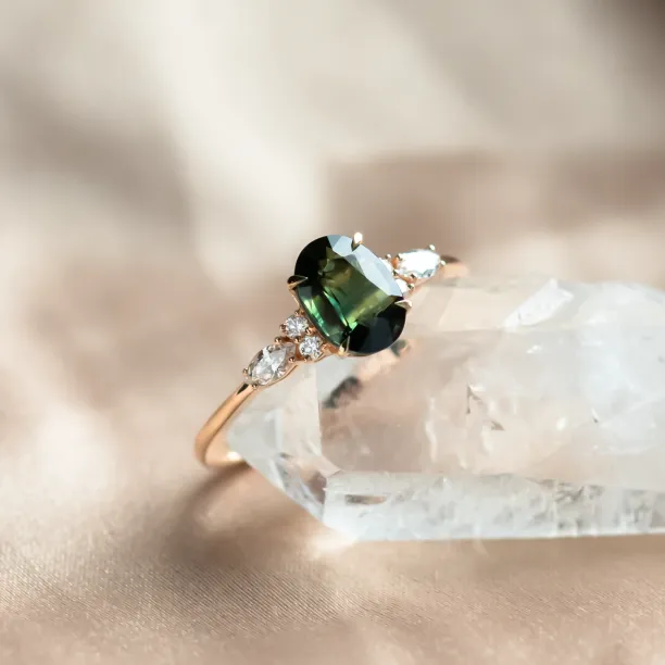 Oval cut sapphire ring with marquise diamonds ETERNELLE Image