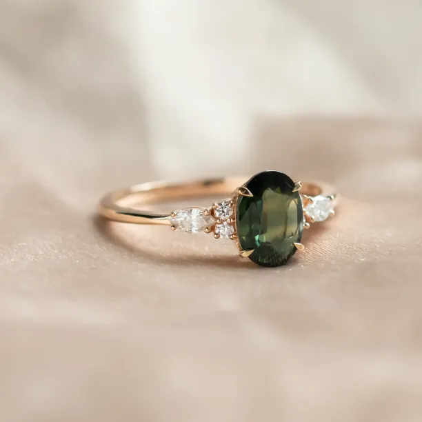 Oval cut sapphire ring with marquise diamonds ETERNELLE Image