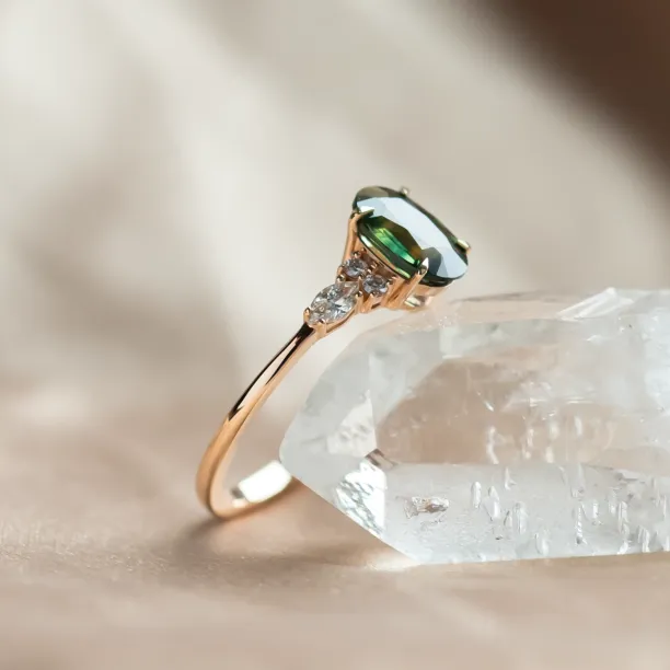 Oval cut sapphire ring with marquise diamonds ETERNELLE Image