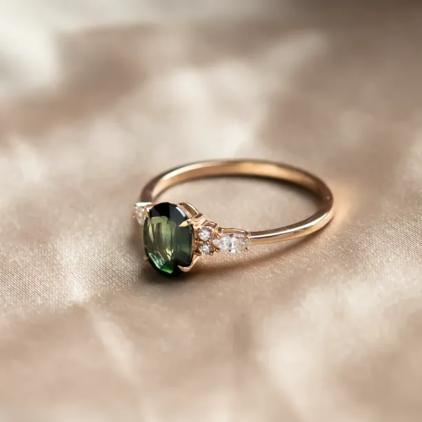 Oval cut sapphire ring with marquise diamonds ETERNELLE Image