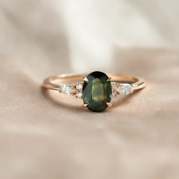 Oval cut sapphire ring with marquise diamonds ETERNELLE Image