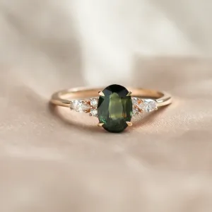 Oval cut sapphire ring with marquise diamonds ETERNELLE