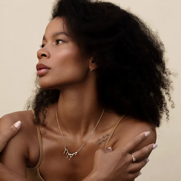 Minimalist gold earrings waves MIGNON Image