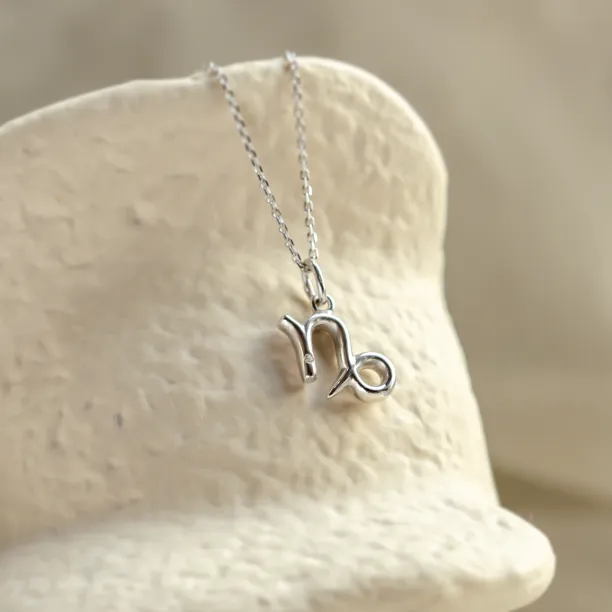 Gold diamond pendant CAPRICORN Image