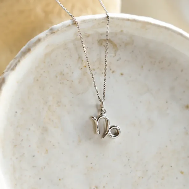 Gold diamond pendant CAPRICORN Image