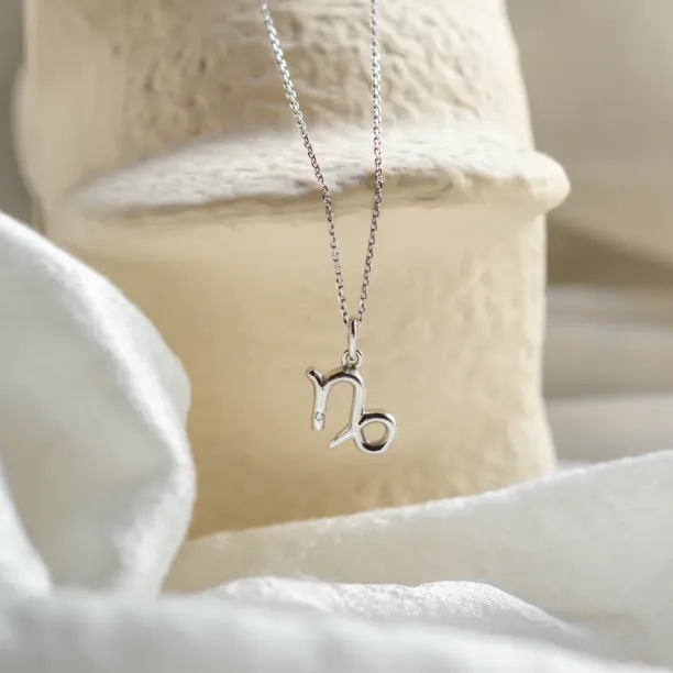 Gold diamond pendant CAPRICORN Image