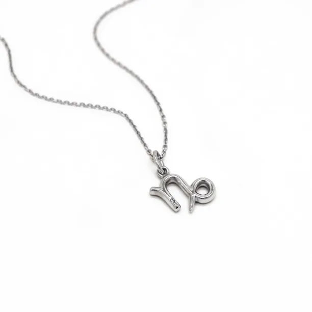 Gold diamond pendant CAPRICORN Image