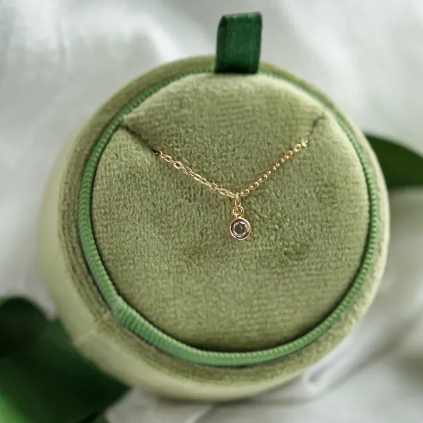 Gold pendant with bezel salt and pepper diamond SAND Image