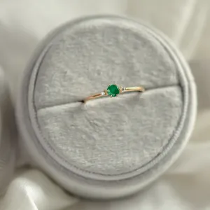Engagement ring with emerald and side diamonds AVA Thumbnail