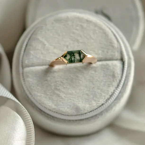 Original east west ring with trendy solid bezel and hexagonal moss agate SEI Image