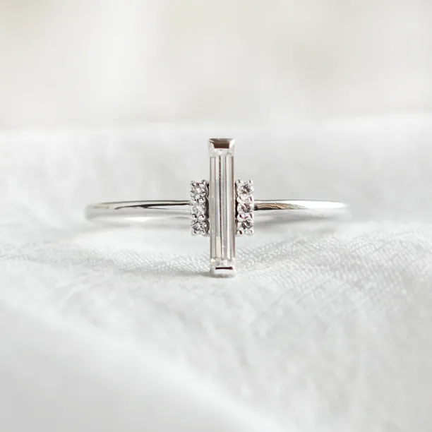 An unconventional engagement ring with a central baguette moissanite ETHEL Image