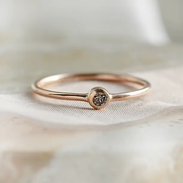 Minimalist engagement ring with salt and pepper diamond in bezel style FLAIR Image