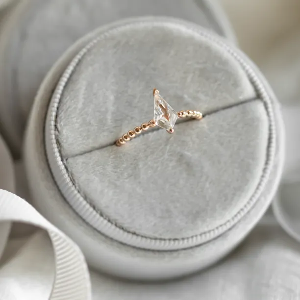 Engagement ring with beaded ball setting and kite moissanite BREEZE Image