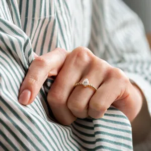 Gold engagement ring with beaded ball setting and pear moissanite BEAU