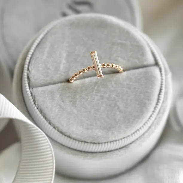 Beaded ball engagement ring with baguette moissanite ECLA Image