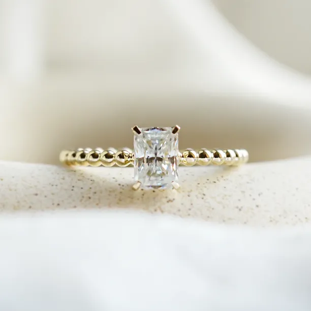 Engagement beaded ball ring with radiant moissanite CLEA Image