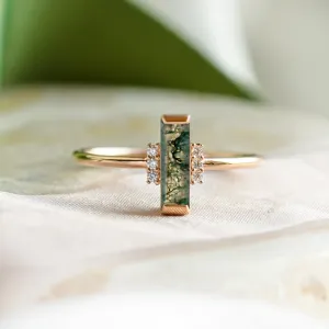 Unusual engagement ring with baguette moss agate and diamonds BRONTE