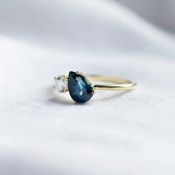 Toi et Moi engagement ring with blue pear sapphire and round diamond COUPLE Image