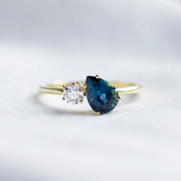 Toi et Moi engagement ring with blue pear sapphire and round diamond COUPLE Image