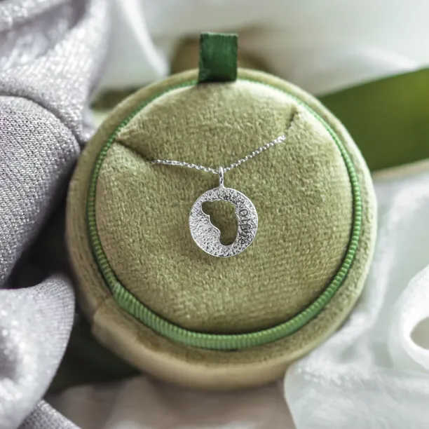 Gold necklace with unusual surface and baby foot trace LEE Image