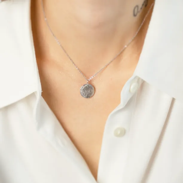 Gold necklace with zodiac sign and unusual surface NALA Image