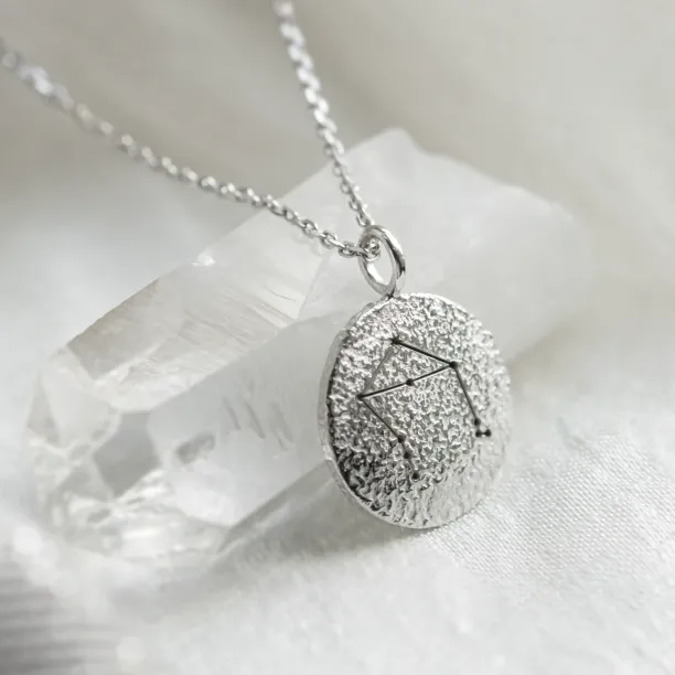 Gold necklace with zodiac sign and unusual surface NALA Image