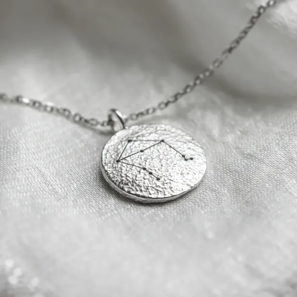 Gold necklace with zodiac sign and unusual surface NALA Image