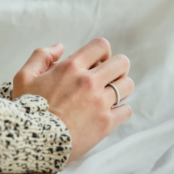 Unusual wedding rings with finely hammered surface LAILA Image