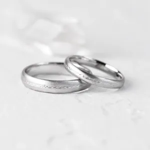 Unusual wedding rings with embossed rope NASH