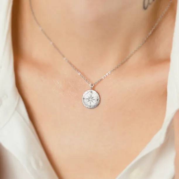 Gold necklace with atypical surface in compass design FAITH Image