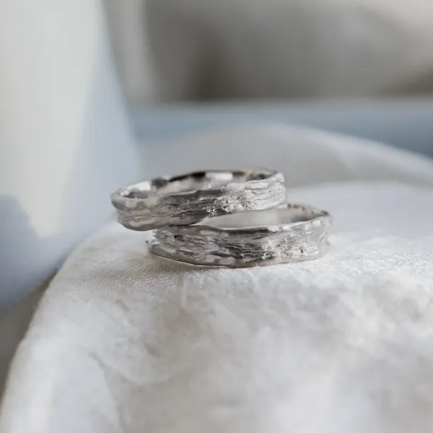 Unusual wedding rings with natural surface ARETA Image