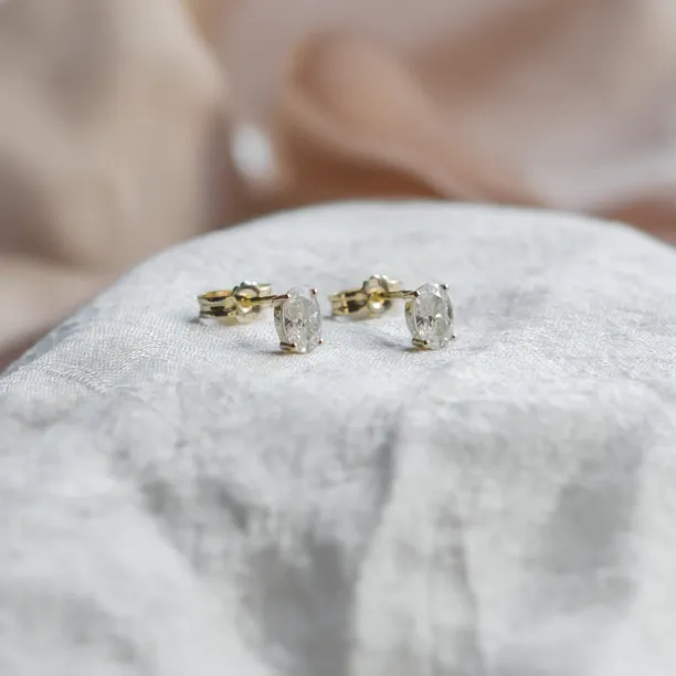 Gold minimalist earrings with oval moissanites CAROLYNE Image