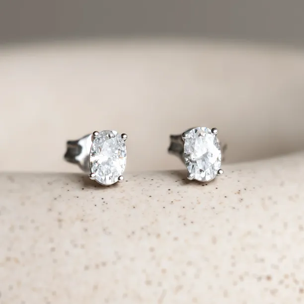 Gold minimalist earrings with oval moissanites CAROLYNE Image