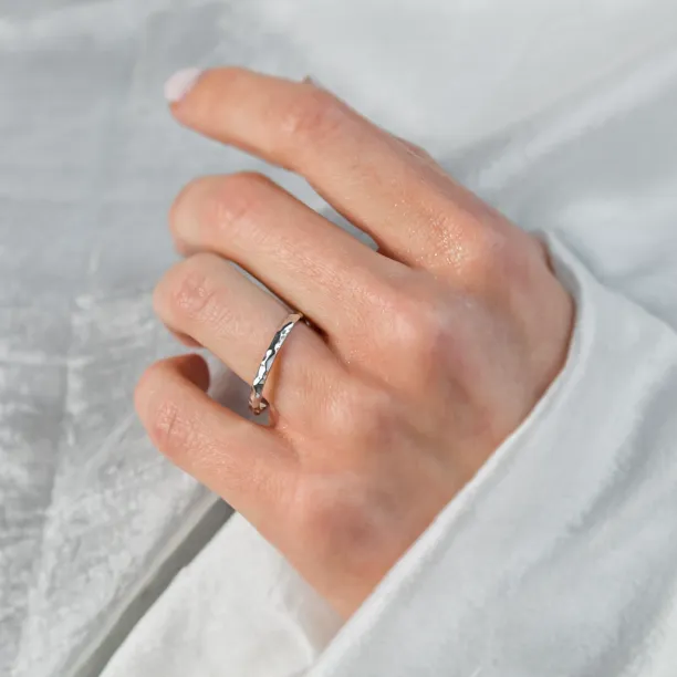 Unusual wedding rings with a shiny ESTELA Image