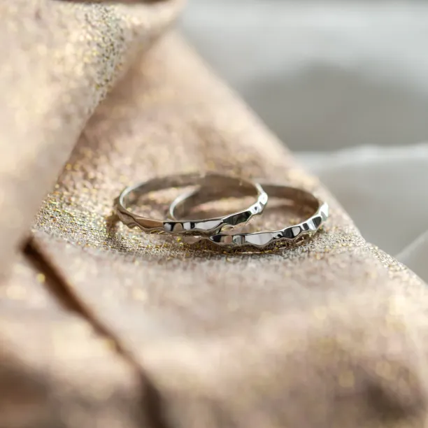 Unusual wedding rings with a shiny ESTELA Image