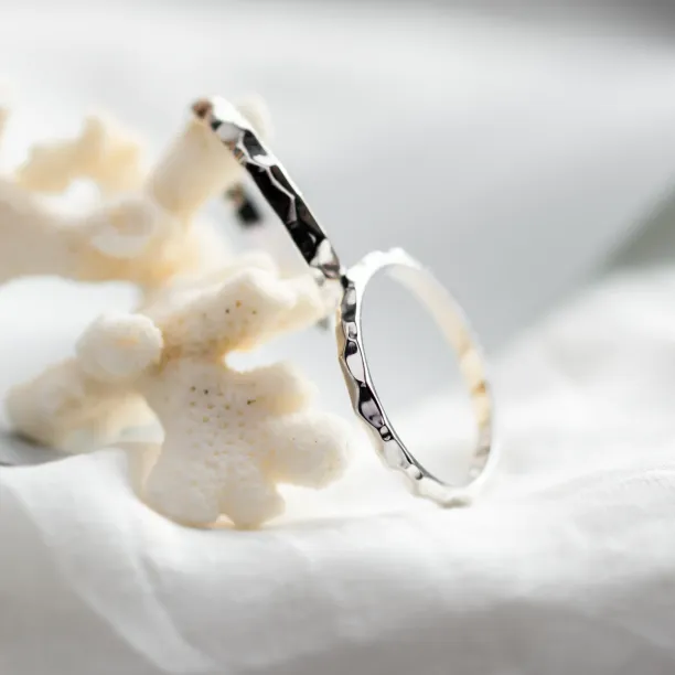 Unusual wedding rings with a shiny ESTELA Image