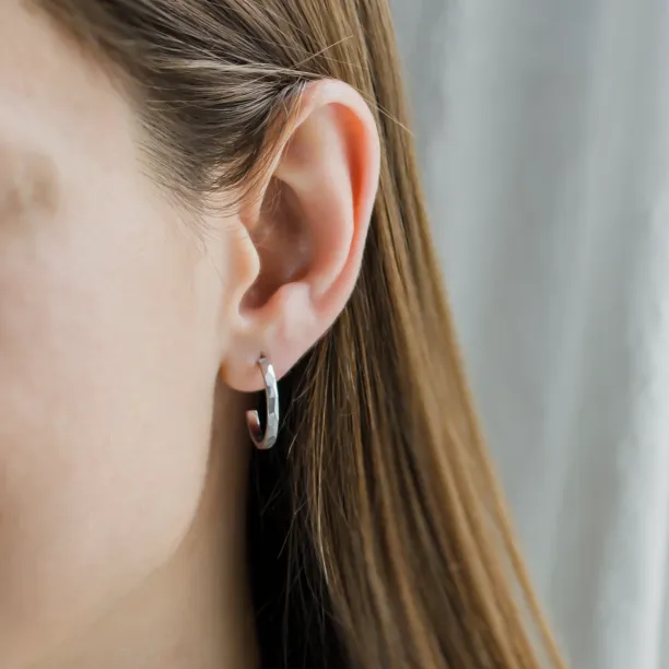 Gold circle earrings with hammered surface ISLA Image