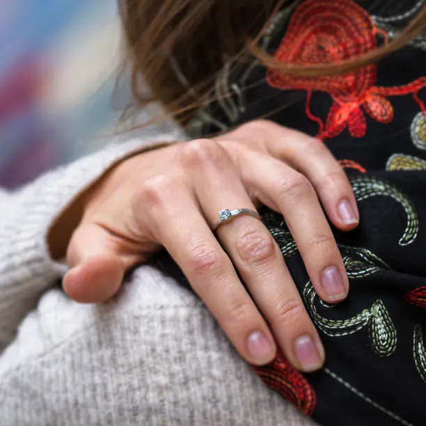 Atypical engagement ring with diamond and tree bark surface RIA Image