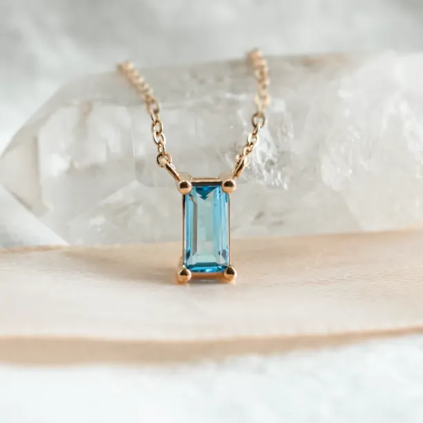 Gold necklace with a baguette cut topaz LUCERNE Image