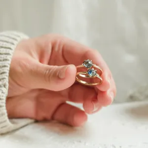 Gold ring with asymmetric sapphire SIGNIFICA Thumbnail