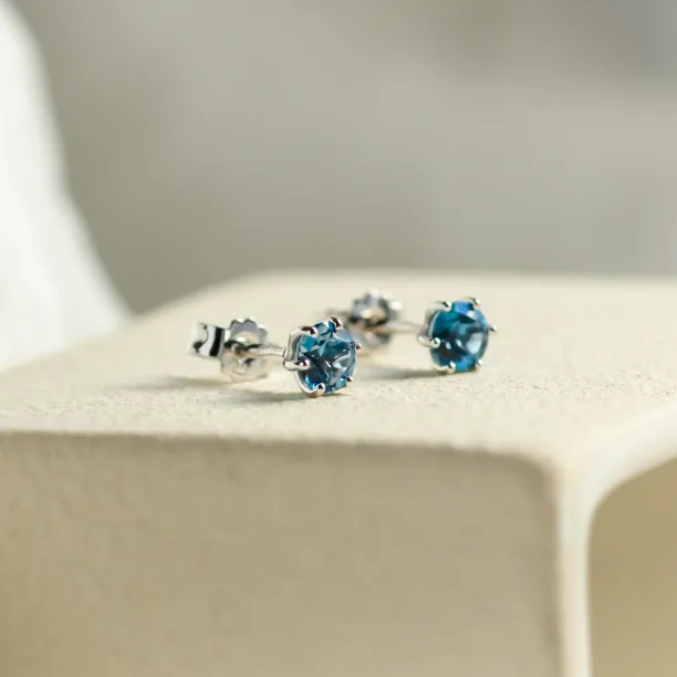 Stud earrings with blue topaz DENIM Image
