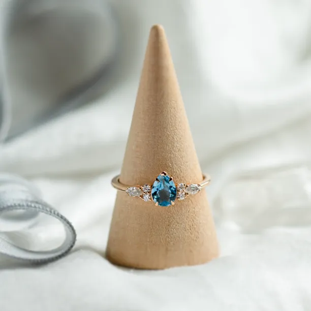 Gold ring with topaz and moissanites ASTROS Image