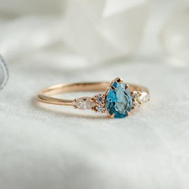 Gold ring with topaz and moissanites ASTROS Image