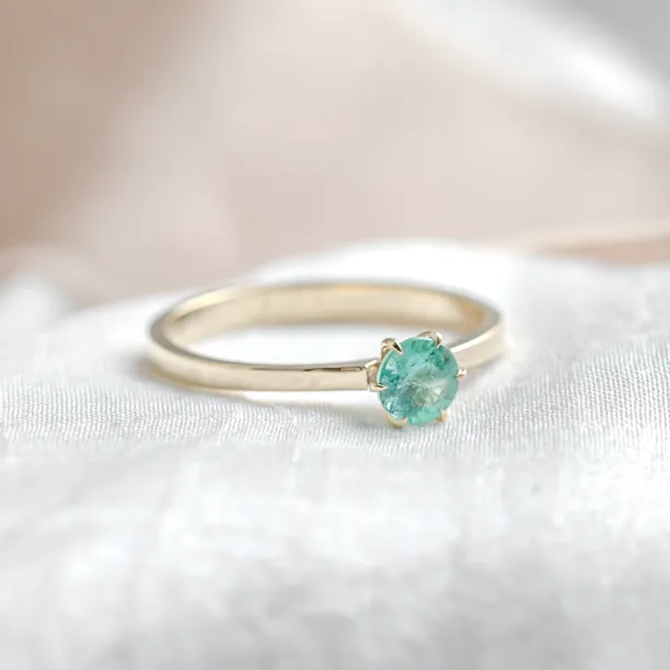 Gold engagement ring with emerald JADE Image