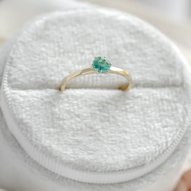 Gold engagement ring with emerald JADE Image