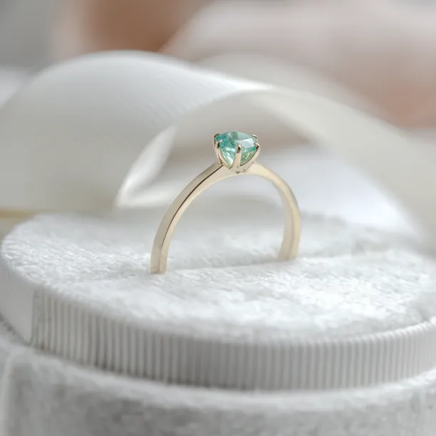 Gold engagement ring with emerald JADE Image