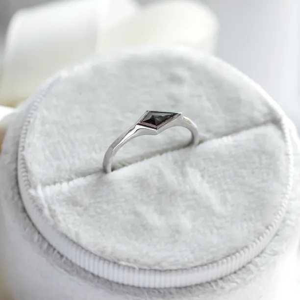 Ring with hammered surface and salt and pepper diamond DART Image