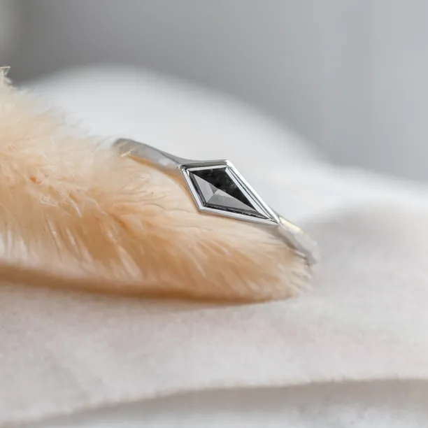 Ring with hammered surface and salt and pepper diamond DART Image
